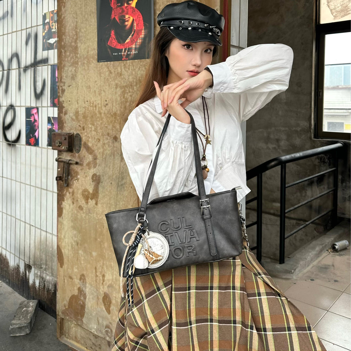 CULTIVATOR YS-24140 East-West Shoulder Bag Brown - Model Standing by Door