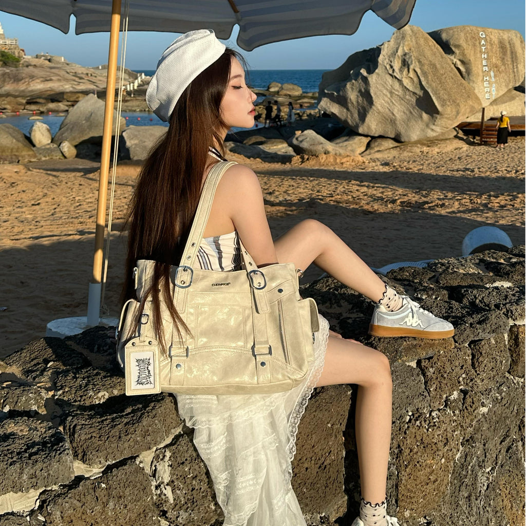 CULTIVATOR YS-25032 Moto Cargo Large Shoulder Bag White - Beach Model Sitting on Rock