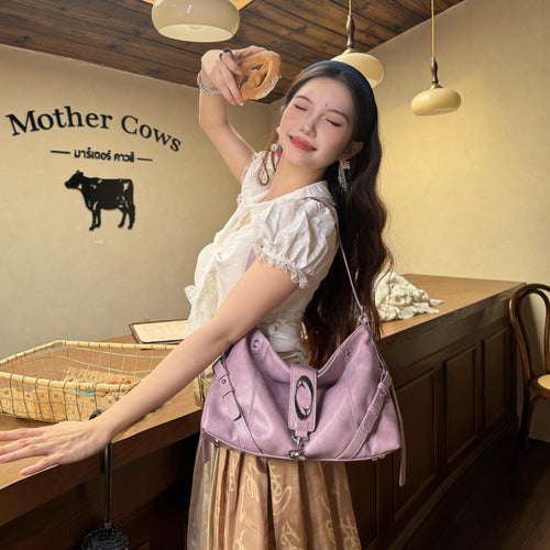 CULTIVATOR YS-25082 Crescent Hobo Bag Purple - Model in Cafe with Bagel
